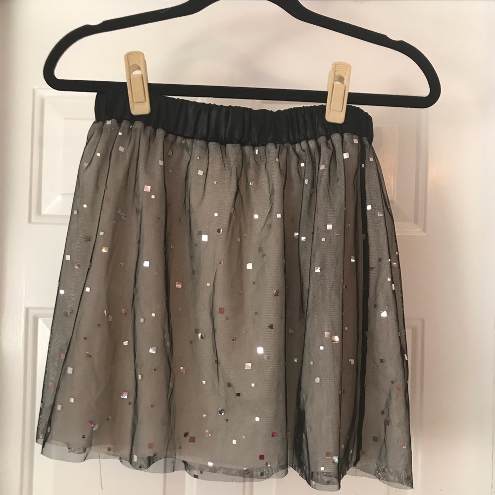 a black circle skirt with some glittery details!
